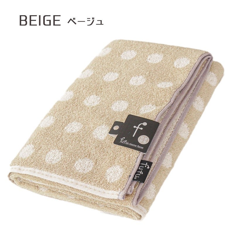 ベージュのバスタオル